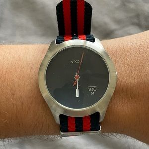 Nixon red & blue strapped watch